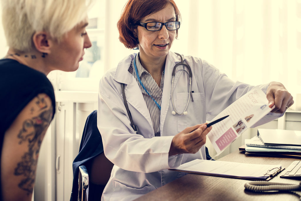 Doctor speaking with patient